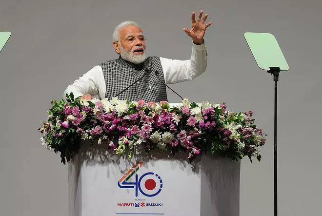Prime Minister Narendra Modi addressing during celebration of 40 years of partnership of Maruti-Suzuki in India at Mahatma Mandir, Gandhinagar on Sunday August 28, 2022. 