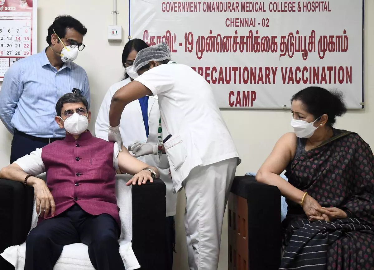 Tamil Nadu Governor Ravindra Narayana Ravi along with his wife Laxmi Ravi take the Precaution Dose (booster dose) of the COVID-19 vaccine at Government Omandurar Medical College Hospital in Chennai on Thursday. Photo : Jothi Ramalingam .B / The Hindu 