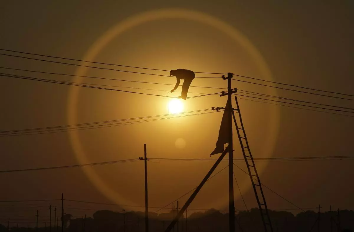 India’s grid reported a record load of 200,570 megawatts (MW) on July 7, 2021, at the height of last summer, according to the National Load Despatch Centre of the Power System Operation Corporation.    REUTERS/Jitendra Prakash