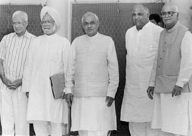  The Prime Minister, Mr. A.B. Vajpayee, is seen with the former Finance Minister, Dr. Manmohan Singh, Congress leader Mr. Sharad Pawar, and Home Minister Mr. L.K. Advani during a meeting in New Delhi on May 14, 1998.