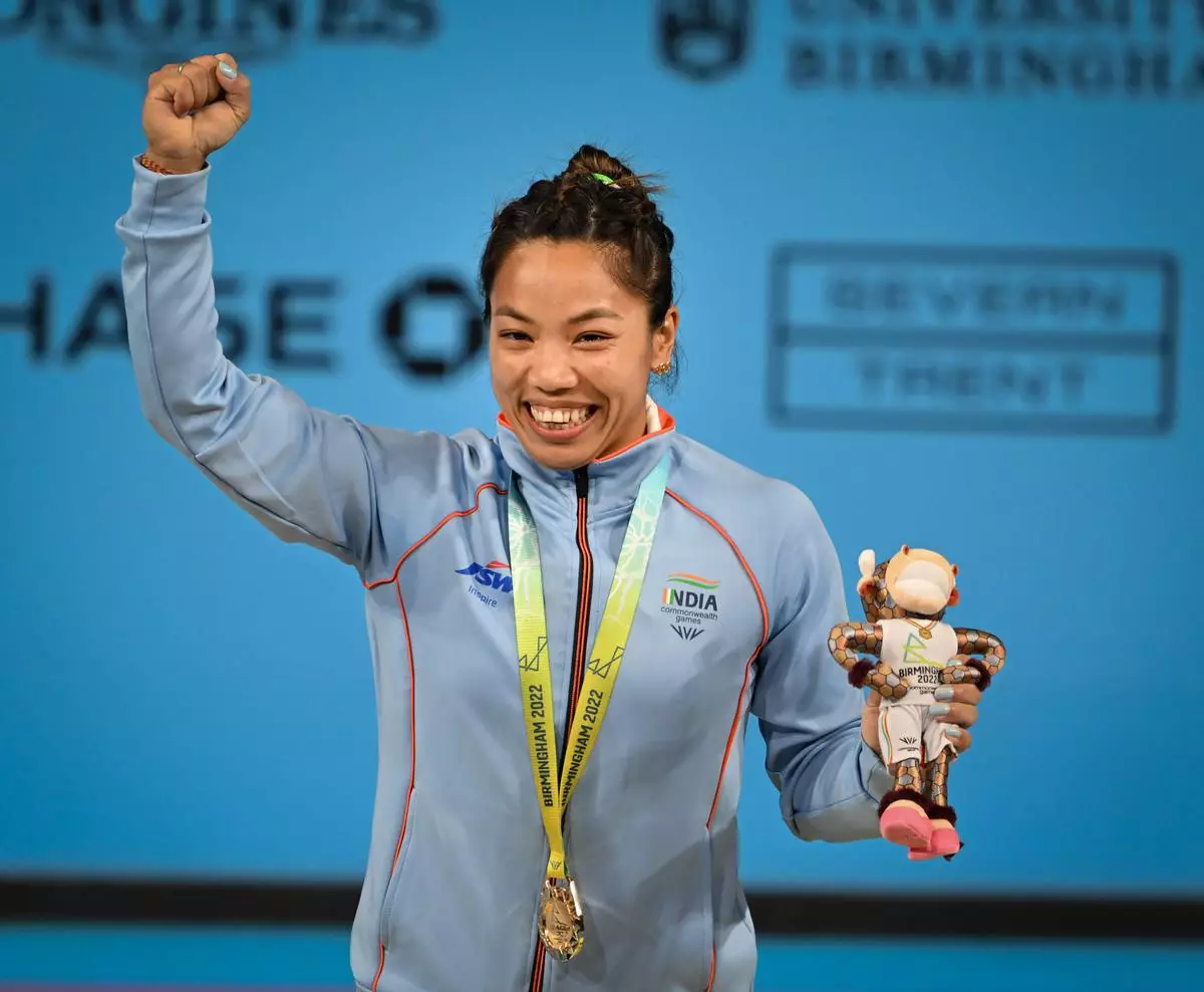India’s Mirabai Chanu reacts after winning the gold medal in the women’s 49kg weightlifting category match of the Commonwealth Games 2022 (CWG), in Birmingham, UK, Saturday, July 30, 2022. 