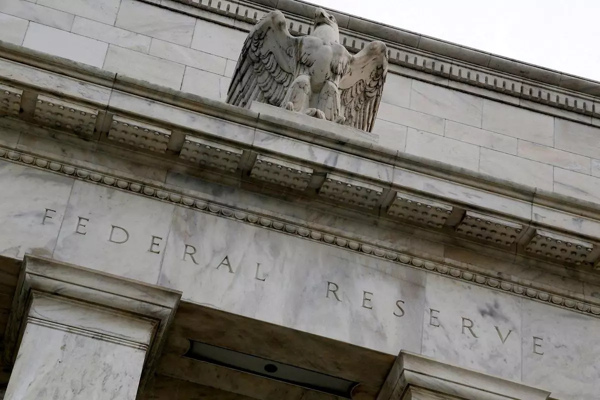 FILE PHOTO: An eagle tops the US Federal Reserve building’s facade in Washington