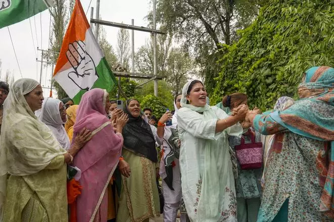 Supporters of the Congress and National Conference celebrate as the Congress-NC alliance leads in the Jammu & Kashmir Assembly elections on Tuesday.