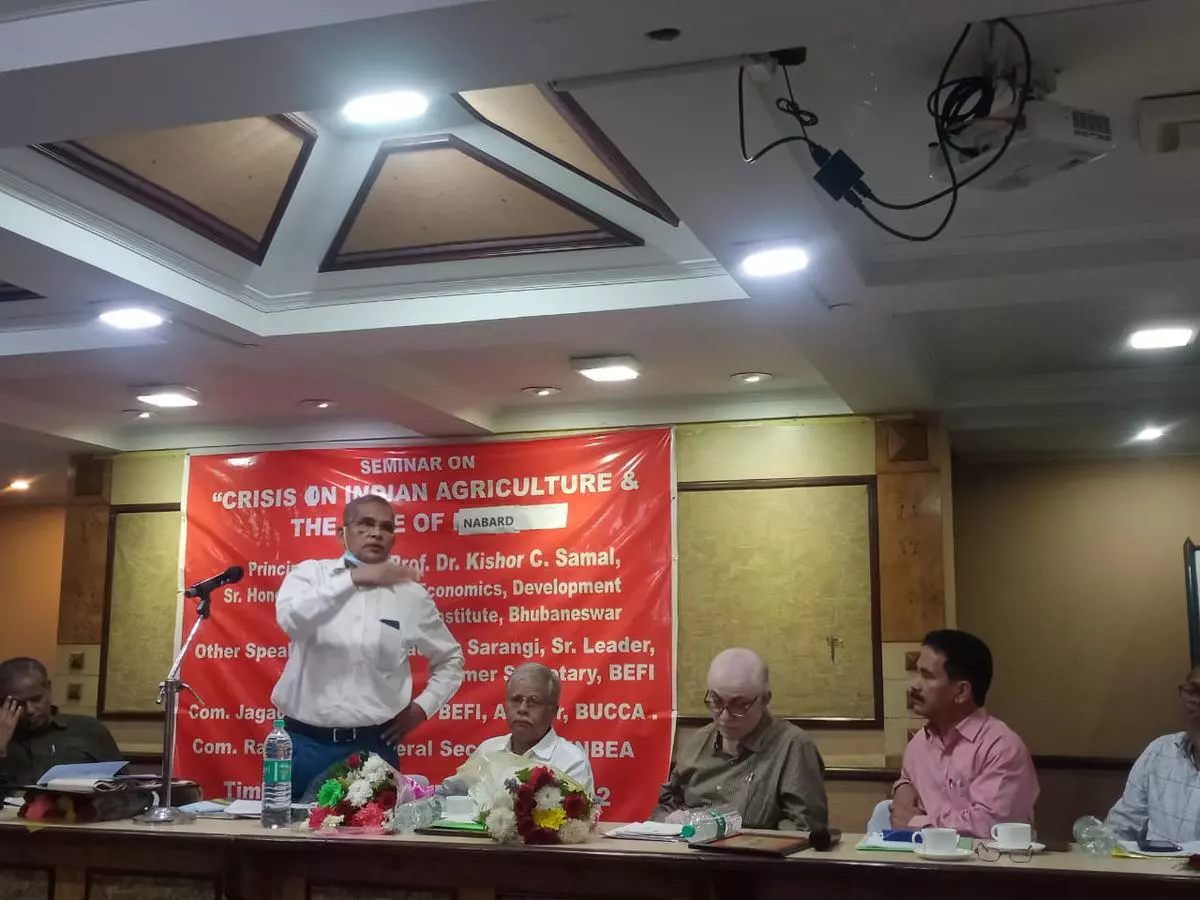 Kishor C Samal, Honorary Professor, Development Research Institute, Bhubaneswar, speaks at the AINBEA session in Bhubaneswar recently. Also seen are (sitting from left), Pradip Sarangi of BEFI, and Rana Mitra of AINBEA, and Balwant Singh Takur.