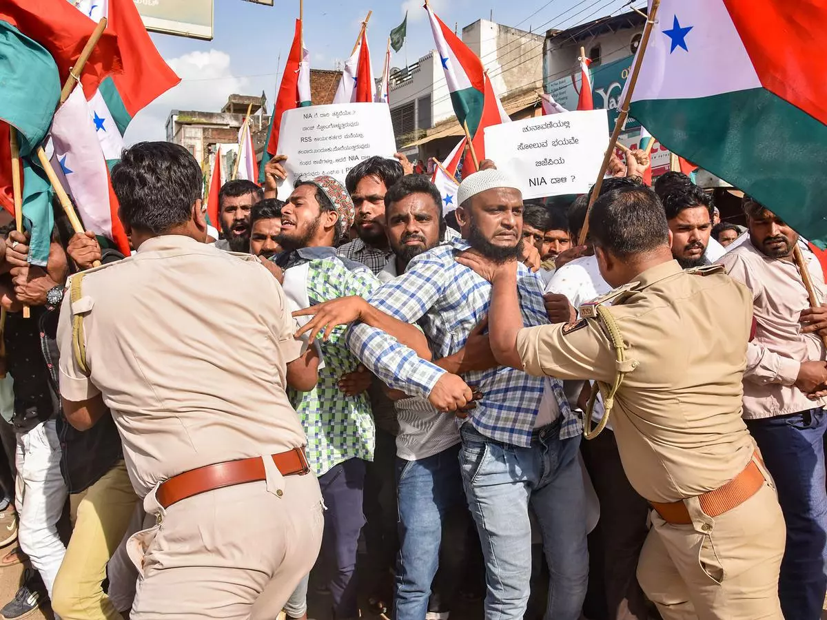 File Photo: Police attempt to detain Popular Front of India (PFI) workers during a protest against the raid of National Investigation Agency (NIA).