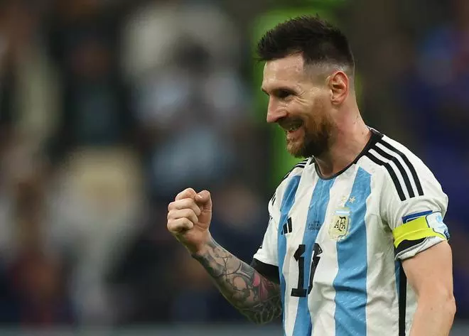 Argentina’s Lionel Messi celebrates after Julian Alvarez scores their third goal.