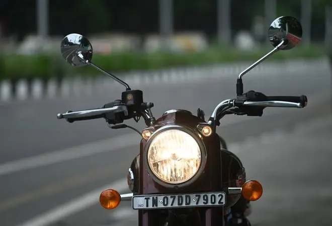 The round headlamp with its bright light throw (halogen now), the tiger’s eye pilot lamps on either side and that signature Royal Enfield casquette (head) that houses these have been replicated in the 2023 Bullet 350. The round headlamp with its bright light throw (halogen now), the tiger’s eye pilot lamps on either side and that signature Royal Enfield casquette (head) that houses these have been replicated in the 2023 Bullet 350.