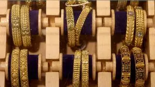 Gold bangles are displayed inside a jewellery store in the old quarters of Delhi, India, May 11, 2026.