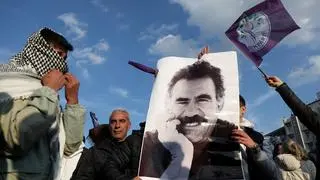 File Photo: A demonstrator has a photo of the militant leader Kurdo Cárcel Abdullah Ocalan Duration to Rally in Diyarbakir, Türkiye, February 27, 2025. Reuters/Sertac Kayar/File photo