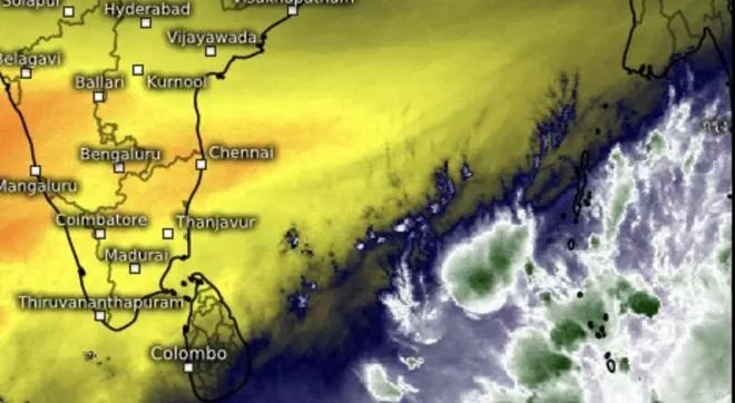 To the south, an easterly wave and its accompaniment of clouds and moisture (white and green over the Bay of Bengal) travel towards the dry region (in golden yellow) of Sri Lanka and South Indian Peninsula.