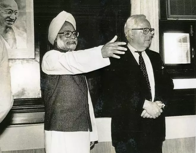 Gordon Binny, President of General Motors and Finance Investment Team Leader of the U.S. delegation, is calling on Finance Minister Dr. Manmohan Singh at his office in New Delhi on March 8, 1994.