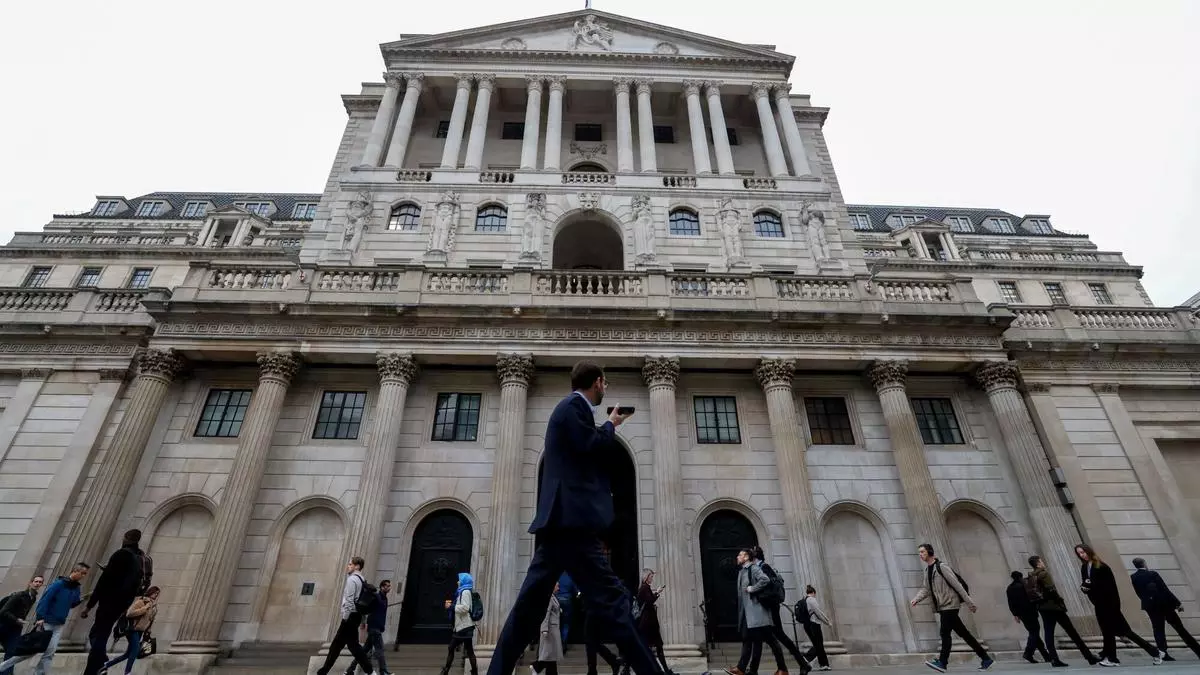 Bank of England cuts interest rates, sees inflation hike after Reeves' budget