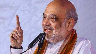 Amit Shah performed a ritual pooja and unveiled a plaque Amit Shah performed a ritual pooja and unveiled a plaque
