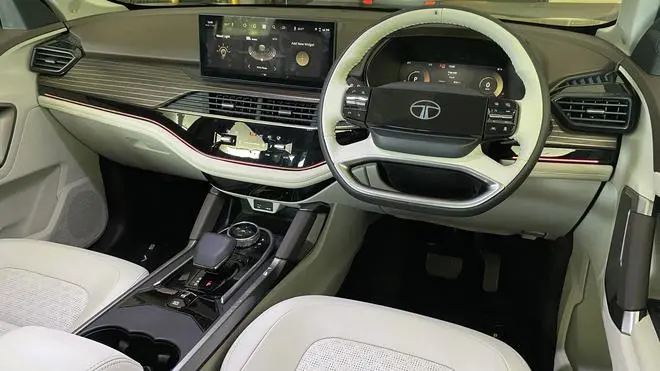 The 2024 Safari’s cabin has many more features that help elevate its premium quotient including dual-zone aircon, a panoramic sunroof, privacy sheers for the windows, ambient lighting, electric adjustments for the two front seats including a ‘Boss mode’ for the front passenger seat which allows second-row occupants to push it forward for more legroom The 2024 Safari’s cabin has many more features that help elevate its premium quotient including dual-zone aircon, a panoramic sunroof, privacy sheers for the windows, ambient lighting, electric adjustments for the two front seats including a ‘Boss mode’ for the front passenger seat which allows second-row occupants to push it forward for more legroom