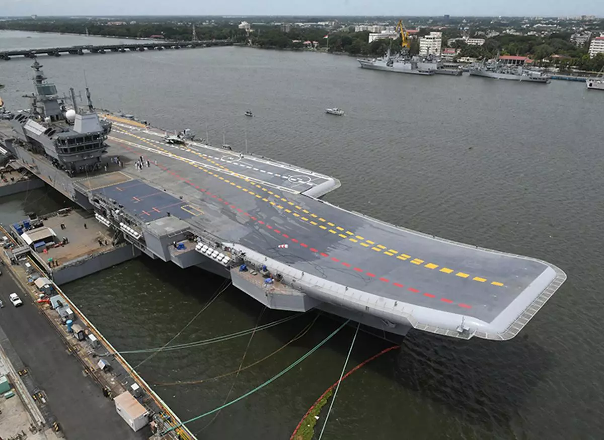 An ariel view of maiden indigenous aircraft carrier berthed at Cochin Shipyard on Saturday ahead of its commissioning as INS Vikrant in a fortnight. Photo : Thulasi Kakkat/The Hindu