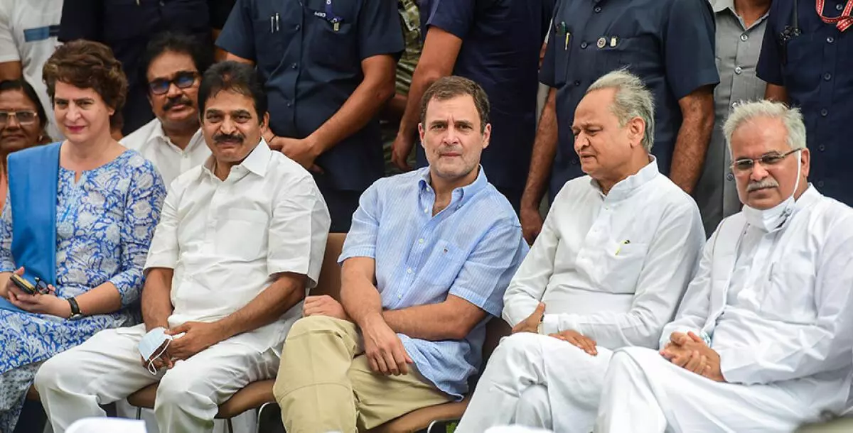 Congress leaders Rahul Gandhi with party leaders Bhupesh Singh Bahgel, Ashok Gehlot, KC Venugopal and Priyanka Gandhi at the AICC headquarters before leaving for the Enforcement Directorate (ED) office to appear in the National Herald case, in New Delhi, Tuesday, June 14, 2022. (PTI)