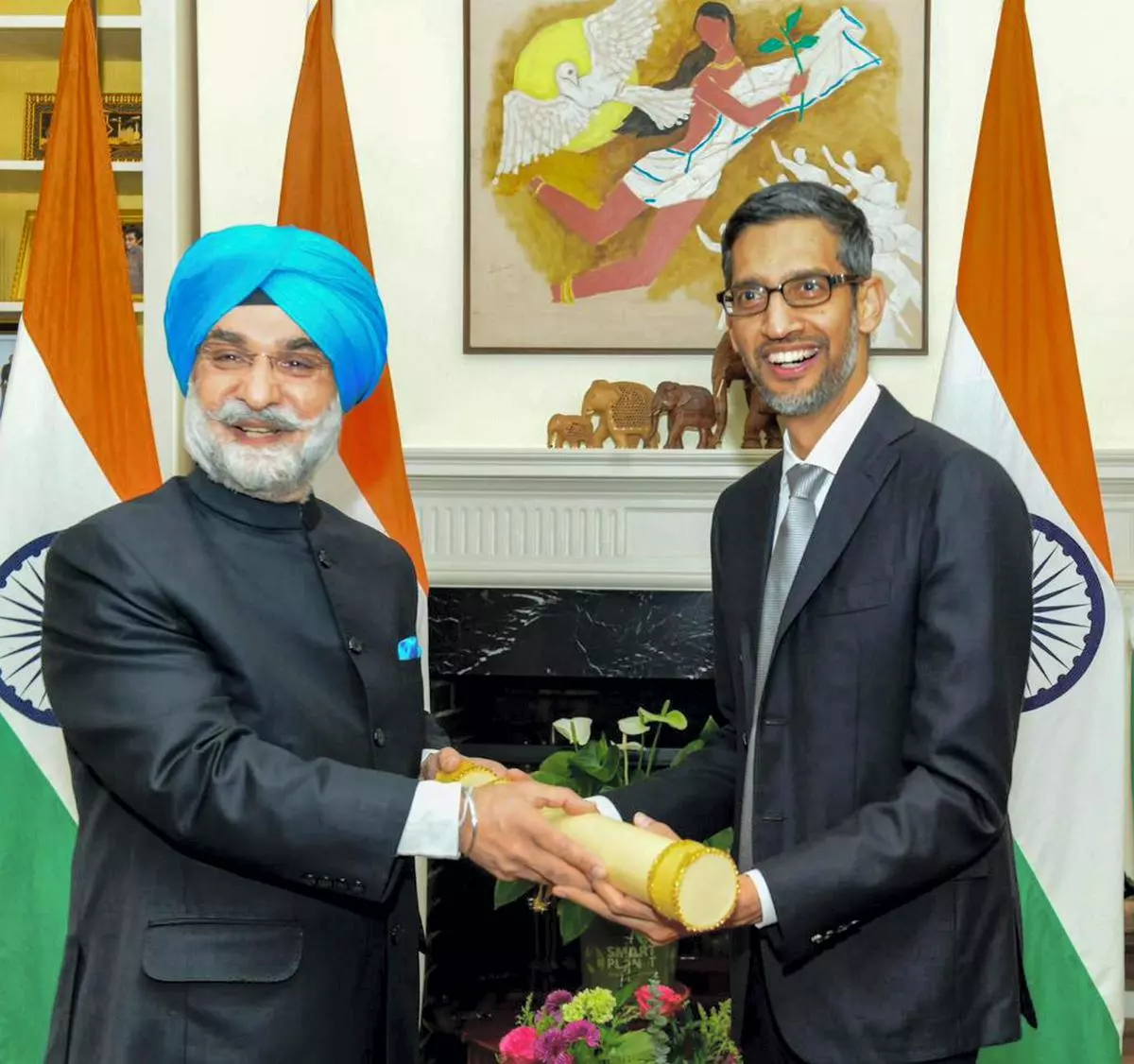 India’s Ambassador to the US Taranjit Singh Sandhu hands over the Padma Bhushan award to Google and Alphabet CEO Sundar Pichai, in San Francisco, USA