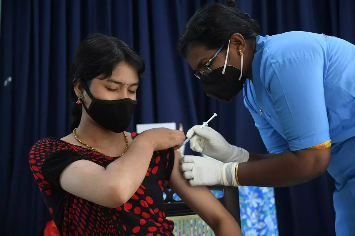 File pic A student gets a dose of Covid-19 vaccine as part of Kerala government’s vaccination for students in schools programme in Kochi. Photo : Thulasi Kakkat