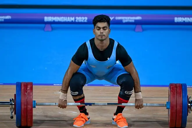 India’s Achinta Sheuli in action during the men’s 73kg weightlifting category match of the Commonwealth Games 2022 (CWG), in Birmingham, UK, Sunday, July 31, 2022. Sheuli secured the third CWG 2022 gold medal for India. India’s Achinta Sheuli in action during the men’s 73kg weightlifting category match of the Commonwealth Games 2022 (CWG), in Birmingham, UK, Sunday, July 31, 2022. Sheuli secured the third CWG 2022 gold medal for India.