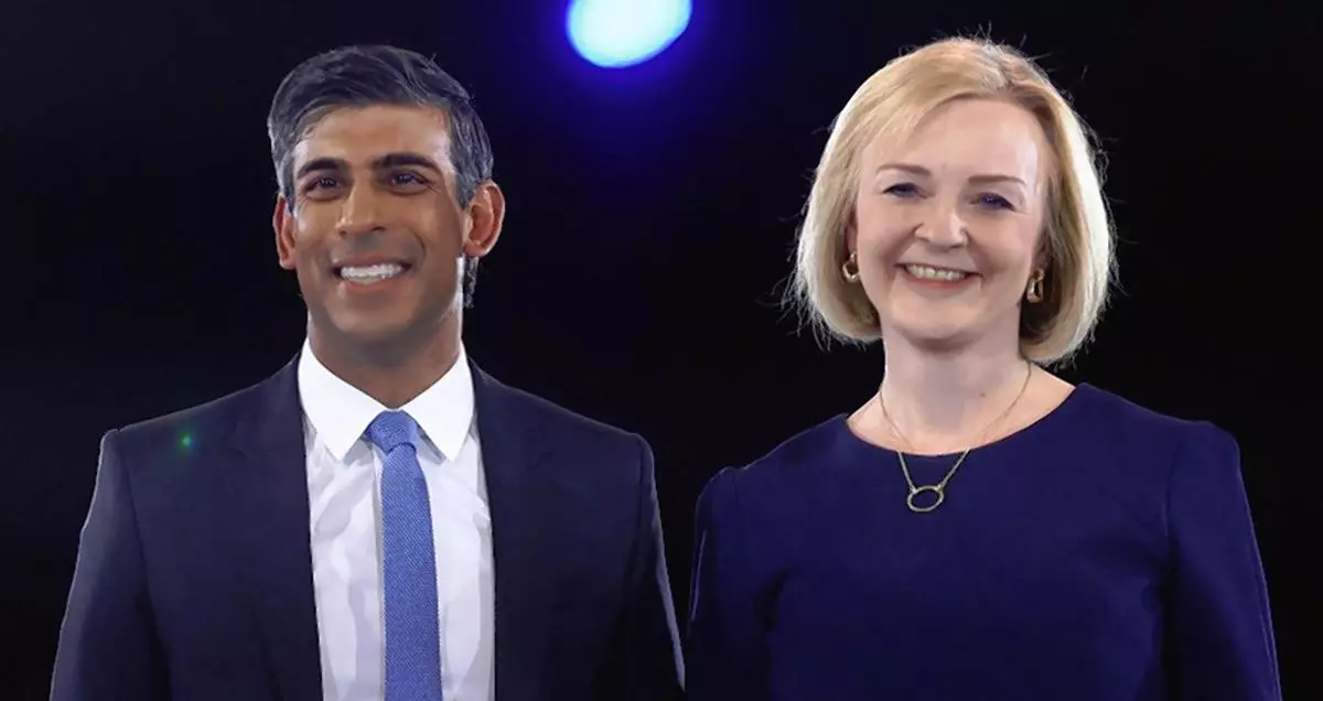 Conservative leadership candidates, Liz Truss and Rishi Sunak stand together as they attend a hustings event, part of the Conservative party leadership campaign, in London, Britain.