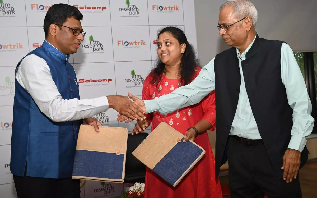 (from left) Sasikumar Gendham, MD, Salcomp India; Anitha Dhianeshwar, Co-Founder, Flowtrik and Ashok Jhunjhunwala, President-IIT Madras Research Park at the signing of MoU  for manufacturing of electric vehicles chargers, in Chennai, on Thursday