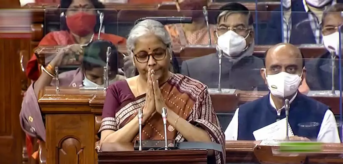 **EDS: TV GRAB** New Delhi: Union Finance Minister Nirmala Sitharaman gestures as she presents the Union Budget 2022-23 in the Lok Sabha, at Parliament, in New Delhi, Tuesday, Feb. 1, 2022. (SANSAD TV/PTI Photo) (PTI02_01_2022_000058B)