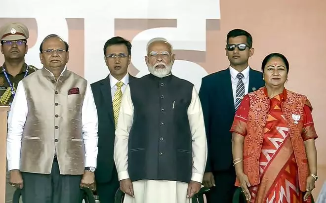 Prime Minister Narendra Modi with Delhi Lt Governor VK Saxena and Delhi Chief Minister-designate Rekha Gupta during swearing-in ceremony of Delhi government.