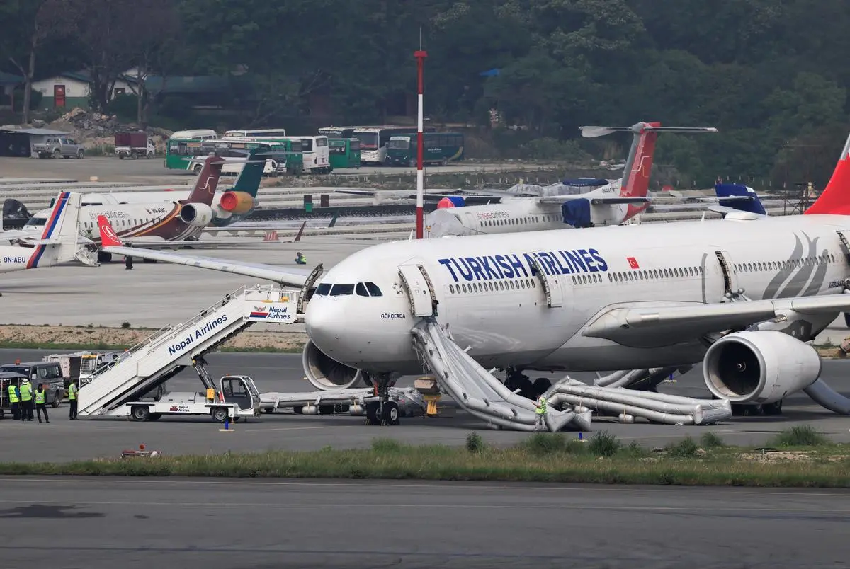 thehindubusinessline.com - Turkish Airlines jet catches fire while landing at Nepal's main airport; all passengers safe