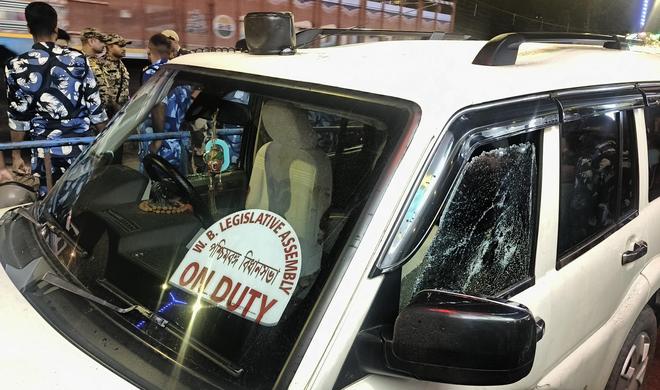 A damaged glass window of a vehicle after BJP leader Suvendu Adhikari's personal assistant Chandranath Rath was shot at from close range by unidentified assailants, according to sources, in West Bengal's North 24 Parganas, Wednesday night, May 6, 2026. A damaged glass window of a vehicle after BJP leader Suvendu Adhikari's personal assistant Chandranath Rath was shot at from close range by unidentified assailants, according to sources, in West Bengal's North 24 Parganas, Wednesday night, May 6, 2026.