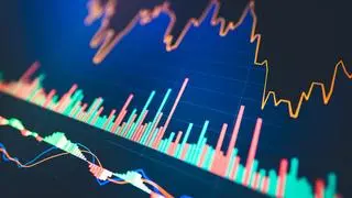 A close-up of a financial chart with trend lines and volume indicators representing data-driven investment strategies, financial market analysis, and modern trading tools. istock photo for BL