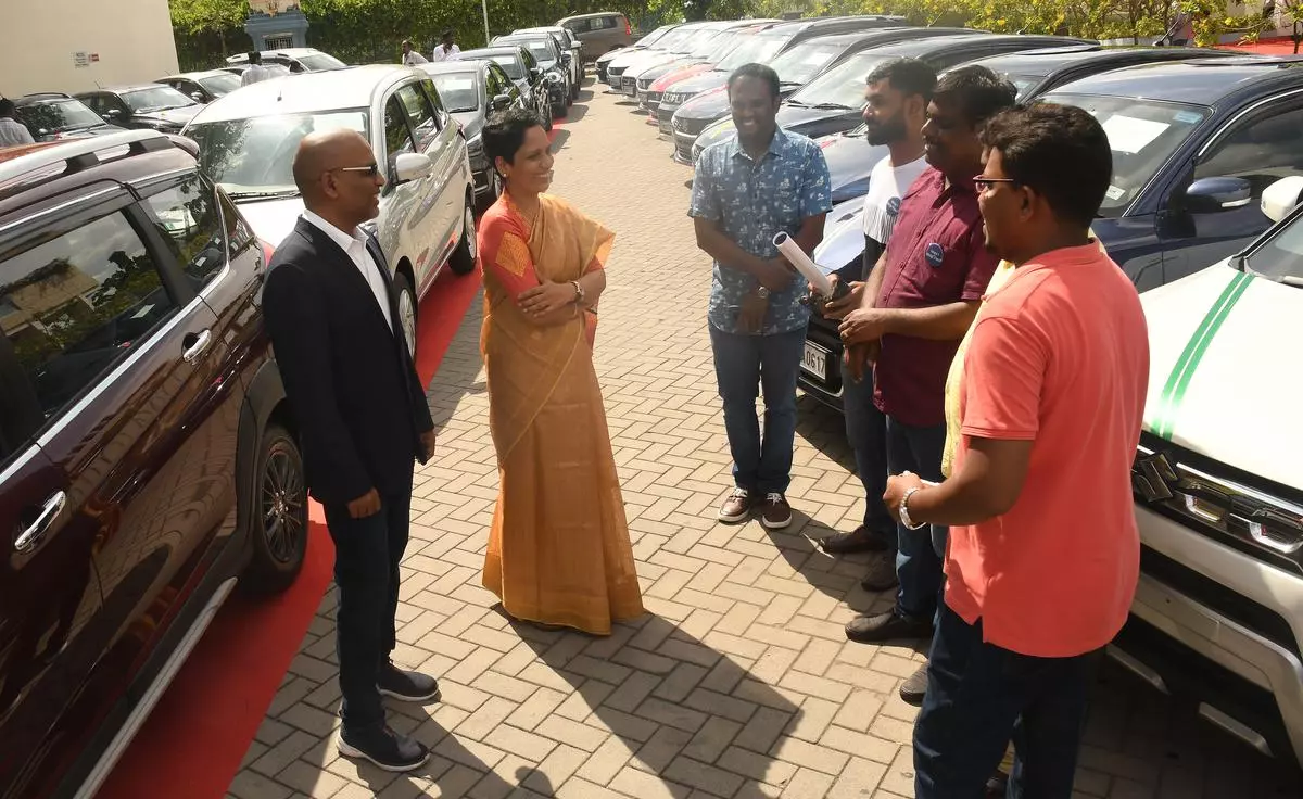 Murali Vivekanandan, Founder and Chairman, Ideas2IT, and Gayathri Vivekanandan, CEO, with employees during the ‘100 cars for 100 employees’ gifting ceremony in Chennai