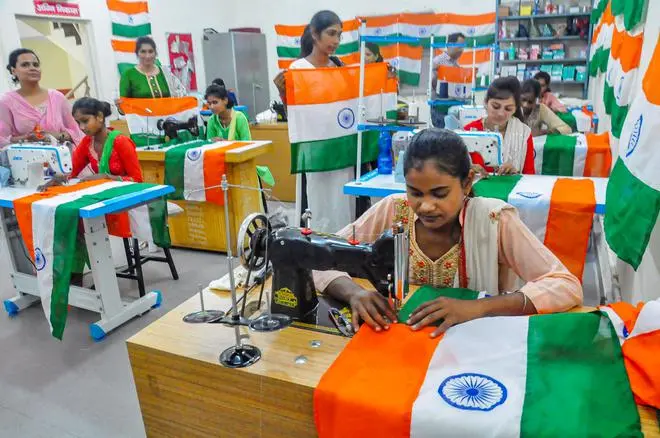 Moradabad: Women belonging to a self help group stitch tricolours for the 'Har Ghar Tiranga' campaign, in Moradabad district, Tuesday, Aug 9, 2022. (PTI Photo) (PTI08_09_2022_000223B) Moradabad: Women belonging to a self help group stitch tricolours for the 'Har Ghar Tiranga' campaign, in Moradabad district, Tuesday, Aug 9, 2022. (PTI Photo) (PTI08_09_2022_000223B)