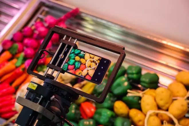 The robot capturing a close-up shot of colourful fake veggies inside a supermarket setup at OPPO Imaging Lab, Dongguan, China