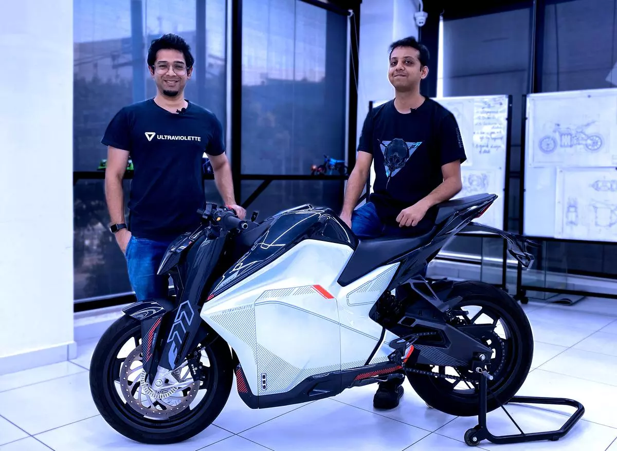 Niraj Rajmohan, Co-Founder and CTO, Ultraviolette Automotive and Narayan Subramaniam, Co- founder and CEO, Ultraviolette Automotive. with the F77.