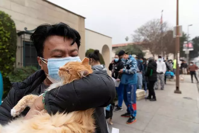 Edgar Hernandez waits outside the Pasadena Humane Society to surrender his cat, after evacuating his home in Altadena, as wildfires in the Los Angeles area forced people to evacuate, in Pasadena, California, U.S. January 8, 2025