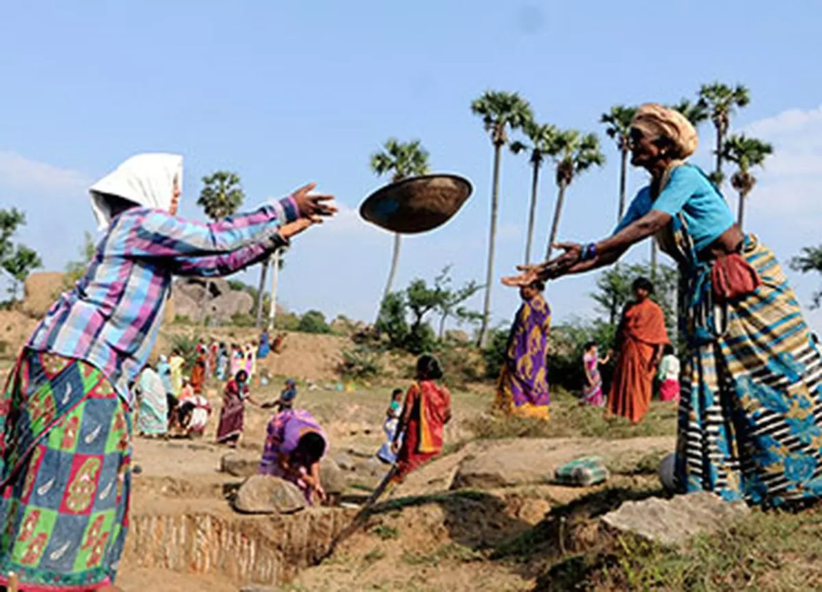 The MNREGA law gives people in rural areas the right to at least 100 days of work per year at the minimum wage