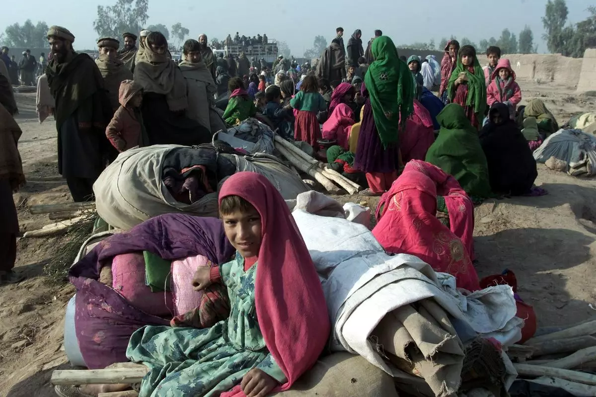 AFGHAN REFUGEES WAIT FOR THEIR TURN TO BE SHIFTED TO NEW CAMP FROM JALOZAI CAMP