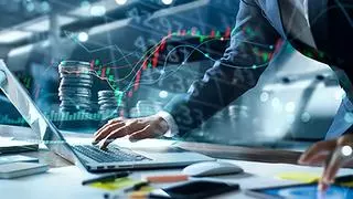 Businessman the utilization of notebook computer trading and diagnosis files on stock market investments funds and digital sources, Economic system, Financial, Banking and commerce currency, Trade investment and finance technology istock photo for BL