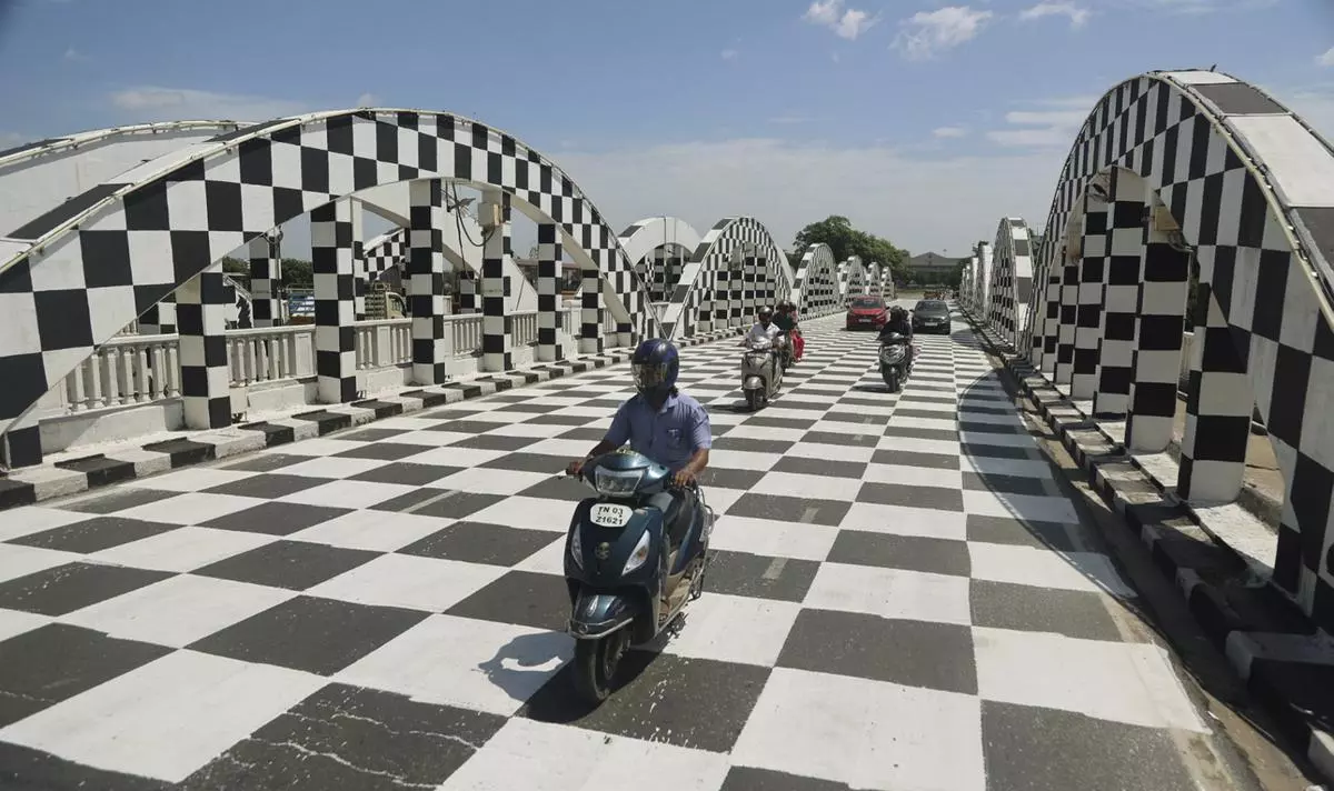 Napier bridge, painted in a black and white checkered pattern, ahead of the 44th International Chess Olympiad at Mamallapuram near Chennai