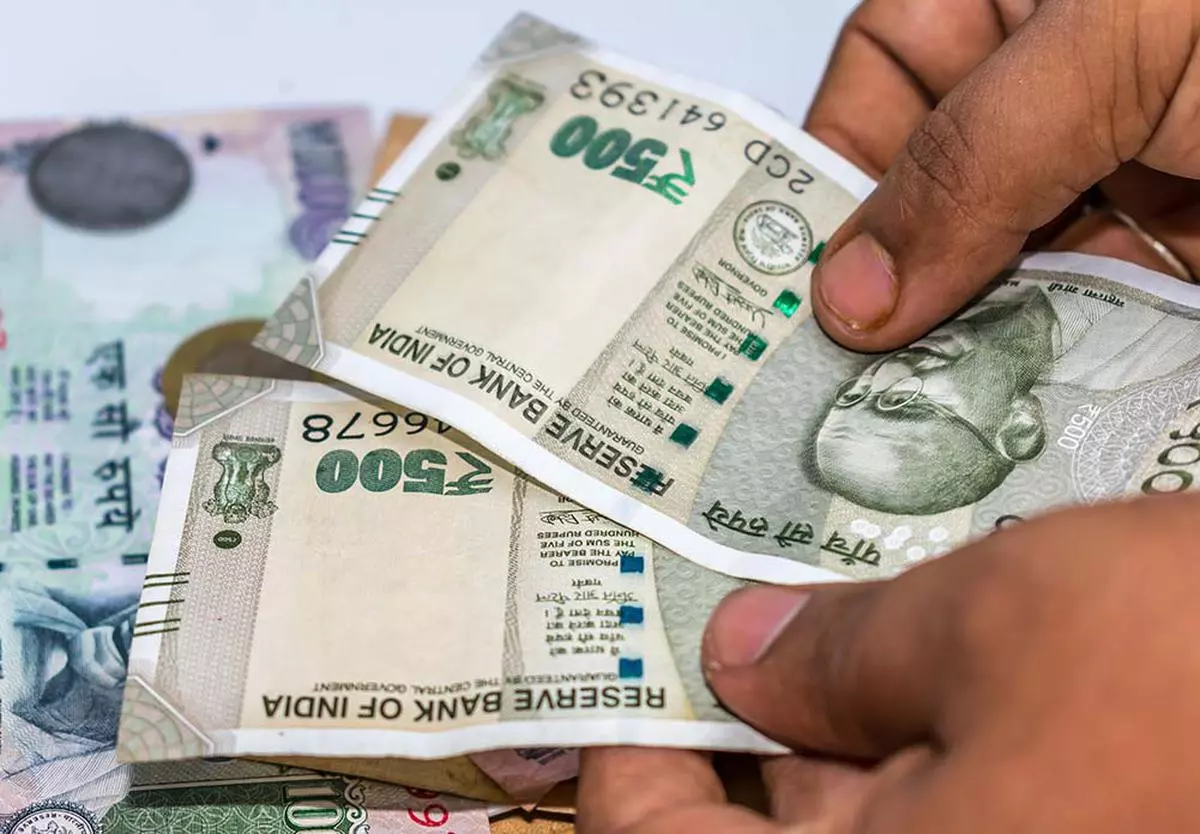 Selective Focus. Profit from business. Texture and background new 500 Indian rupee currency ready for business investment. Corruption clampdown of Indian government with new series of Indian Rupee.