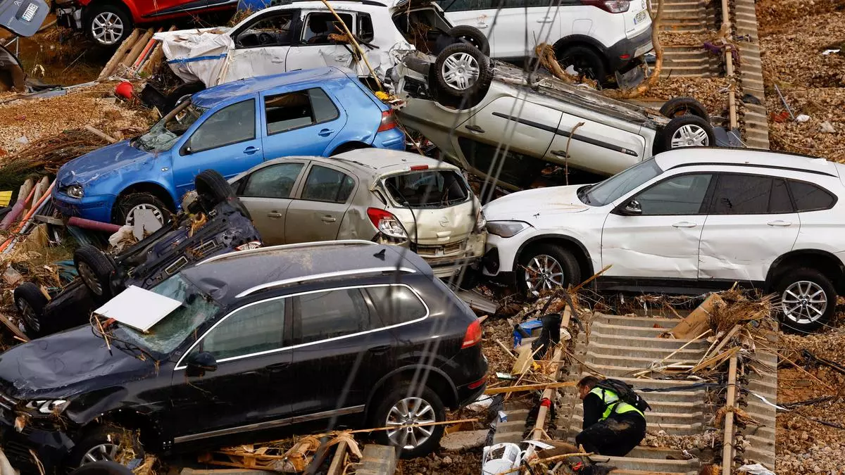 What caused the devastating flash floods in Eastern Spain?