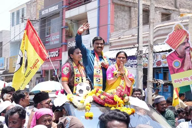 Gali Janardhan Reddy at a large procession before submitting his nomination papers at Gangavathi in Koppal district