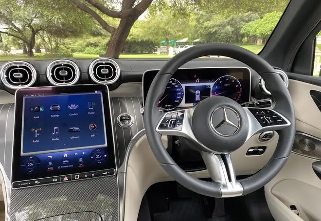 Two design elements dominate the cabin of the new GLC — the slightly oversized steering wheel with its multiple touch controls and the massive 11.9-inch, ultra high-resolution touchscreen infotainment. Two design elements dominate the cabin of the new GLC — the slightly oversized steering wheel with its multiple touch controls and the massive 11.9-inch, ultra high-resolution touchscreen infotainment.