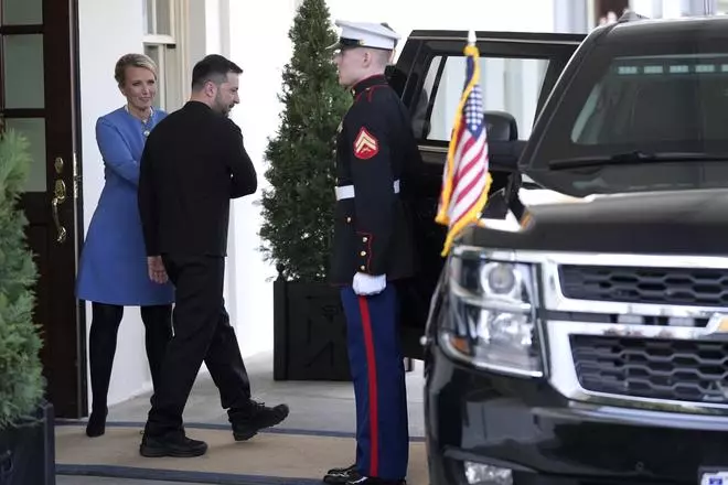 Ukrainian President Volodymyr Zelenskyy, centre, departs after a meeting with President Donald Trump at the White House, Friday, Feb. 28, 2025, in Washington.  