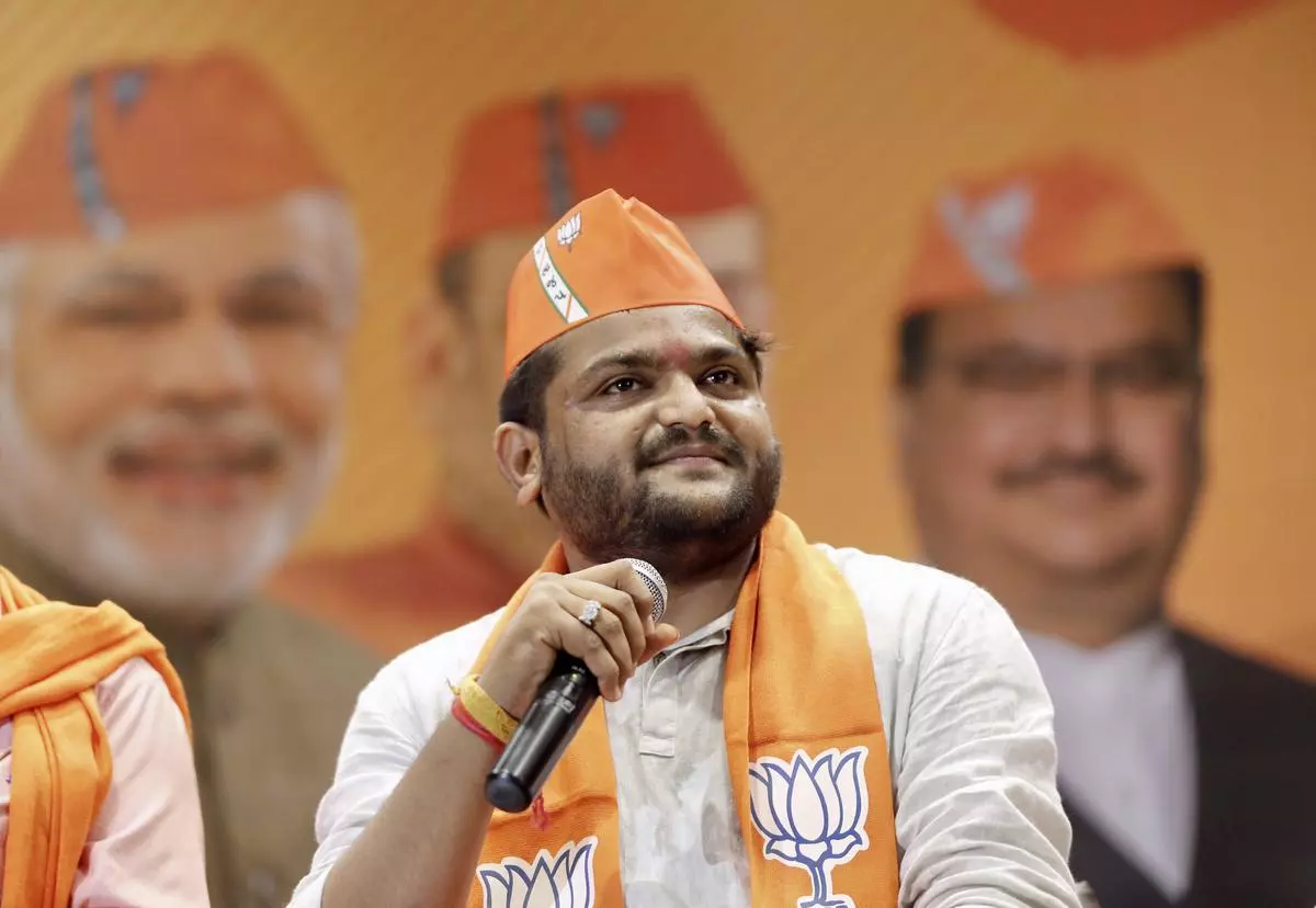 Former Congress leader Hardik Patel looks on as he joins the BJP at the party office Kamalam, in Gandhinagar on Thursday