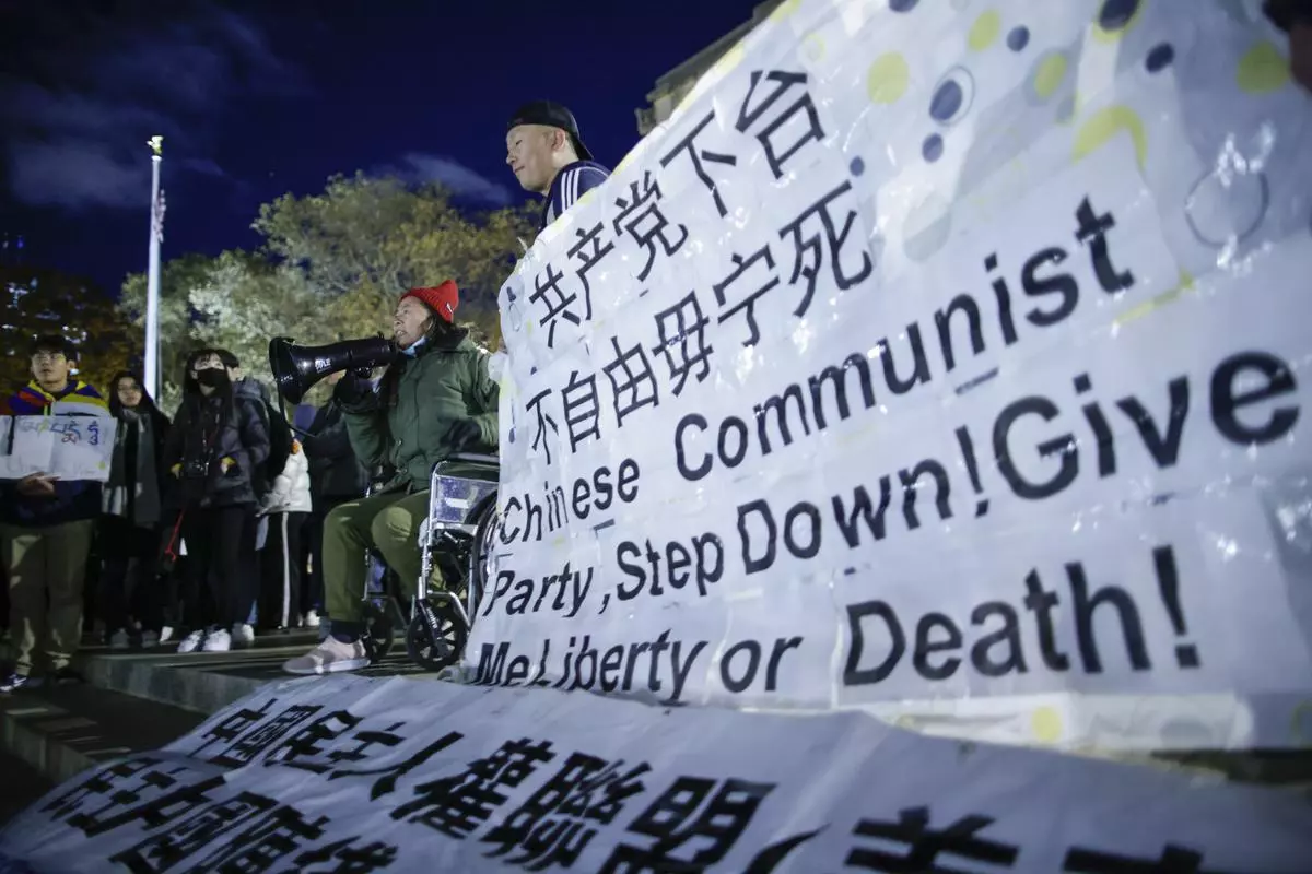 People gather at Columbia University during a protest in support of demonstrations held in China calling for an end to Covid-19 lockdowns, in New York on November 28, 2022