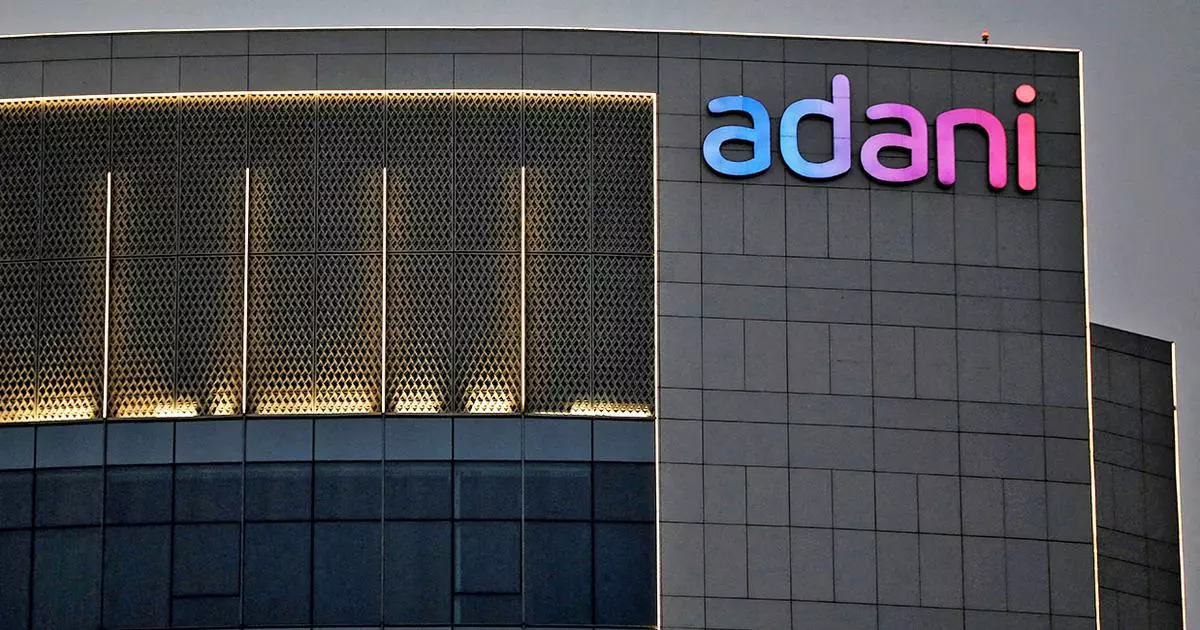 File Photo: The logo of the Adani Group is seen on the facade of one of its buildings on the outskirts of Ahmedabad, India.