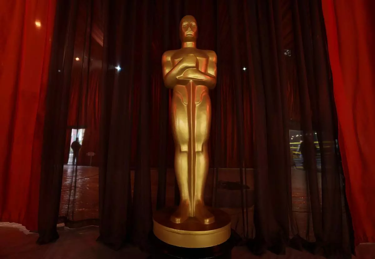An Oscar statue is pictured at the arrivals area, as preparations continue for the 95th Academy Awards in Los Angeles, California, U.S., March 11, 2023. 