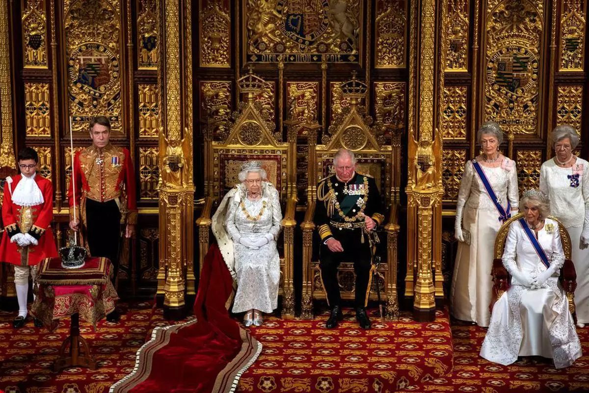 Britain’s Queen Elizabeth, Charles, the Prince of Wales and Camilla, Duchess of Cornwall are seen during the State Opening of Parliament in the House of Lords at the Palace of Westminster in London, Britain October 14, 2019. 