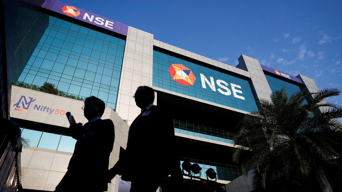 Sensex, Nifty end lower as West Asia tensions weigh; markets await Fed decision